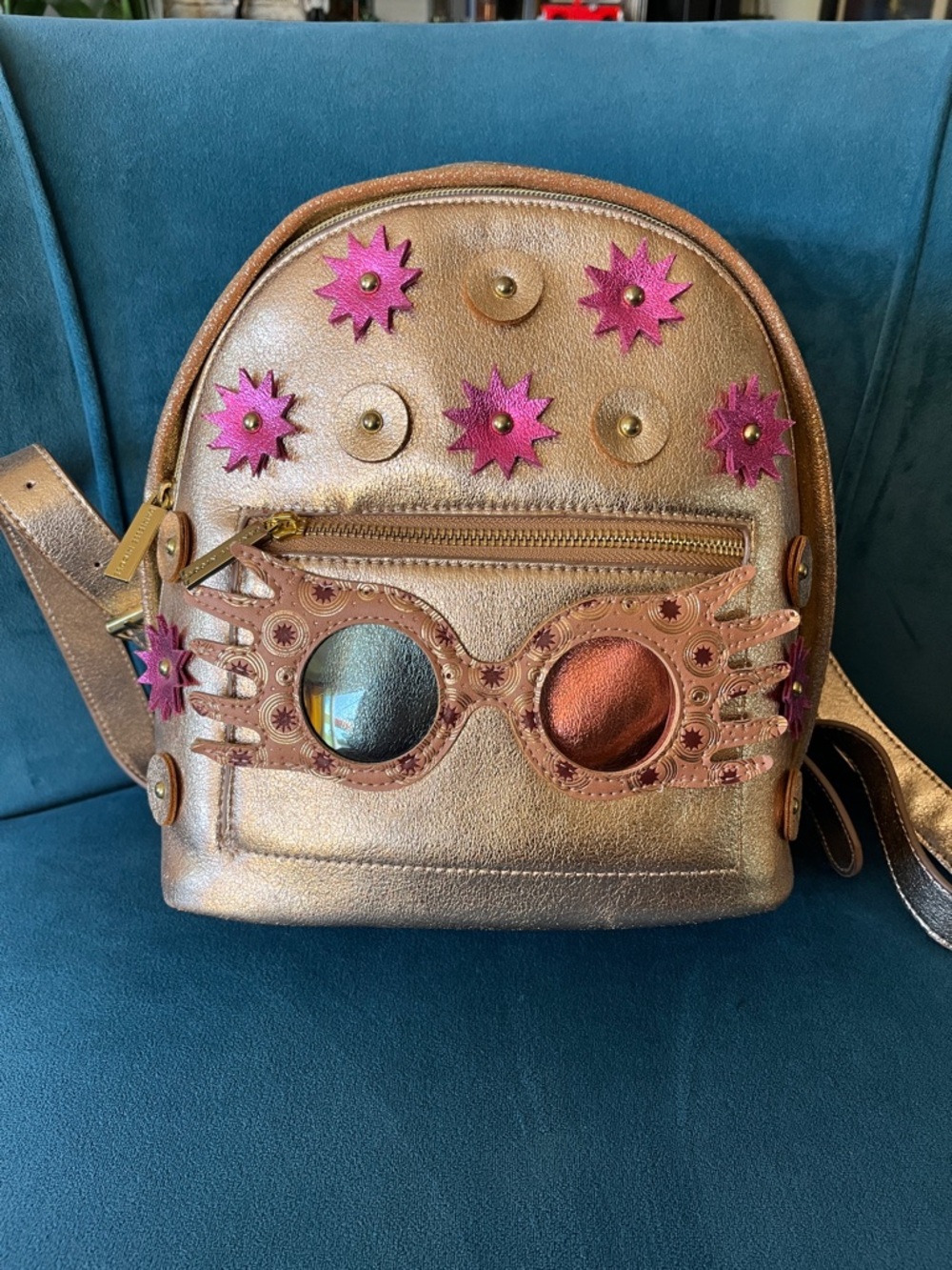 Luna from Harry Potter metallic backpack 
Danielle Nicole